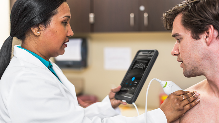 Telefon alături de un produs Lumify